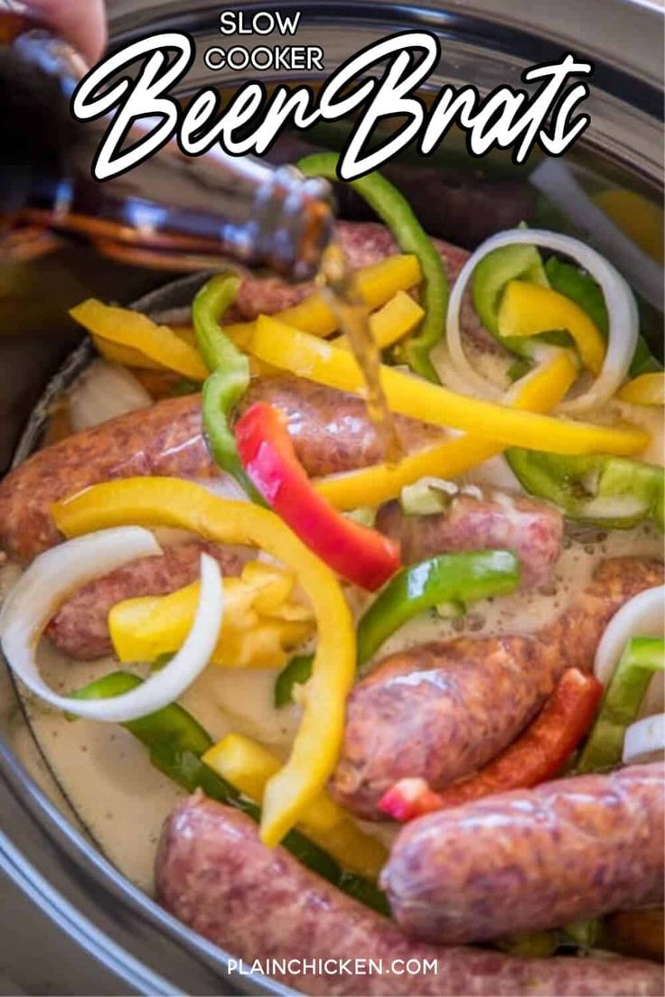 a person is pouring hot dog sauce into a slow cooker with peppers and onions