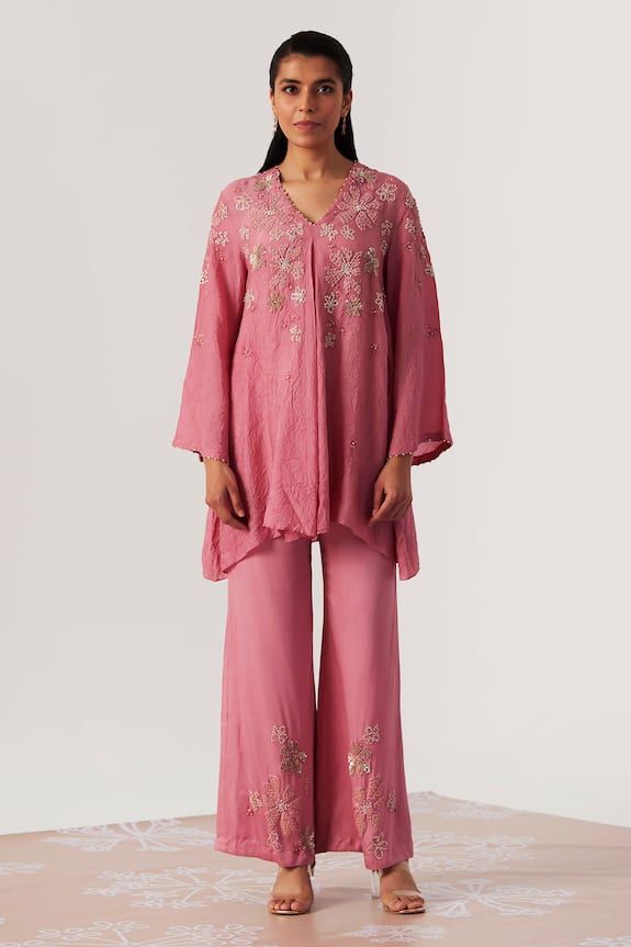 Pink A-line tunic with sequin and beads embroidery in geometric floral motifs. Paired with an embroidered bell bottom pant and separate inner. - Aza Fashions Sequin Tunic, Pant Women, Beads Embroidery, Pant For Women, Pink Tunic, Dresses Indian, Tunic Pattern, Beaded Neckline, Embroidered Tunic