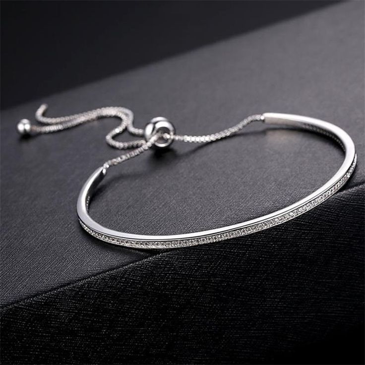 Item Type: Bracelet Gender: Women Material: 925 Sterling Silver, Crystal Shape: Round Length: 18 cm / 7.09 inch Quantity: 1 Pattern: Solid Color: Silver Package Includes: 1 x Bracelet Kate Spade Bracelet, Bracelets Bangle, The Bangles, Silver Bracelets For Women, Christmas Gift Jewelry, Copper Bracelet, Silver Crystal, Pandora Bracelets, Bracelet Collection