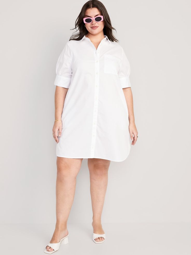 spread collar elbow-length sleeves full-button front patch pocket relaxed fit hits just above knee models are approx.  5'9" and wear sizes s (4), l (12), and xl (18)machine wash according to the care instruction label cotton 100% Relaxed Fit Knee-length Shirt Dress, Relaxed Fit Knee-length Shirt Dress With Placket, Casual Half Sleeve Shirt Dress With Button Closure, Casual Shirt Dress With Roll-up Sleeves And Spread Collar, White Button-up Shirt Dress With Pockets, Casual Half Sleeve Relaxed Shirt Dress, Casual Shirt Dress With Button Cuffs And Shirttail Hem, Casual Half Sleeve Relaxed Fit Shirt Dress, Collared Shirt Dress With Relaxed Fit