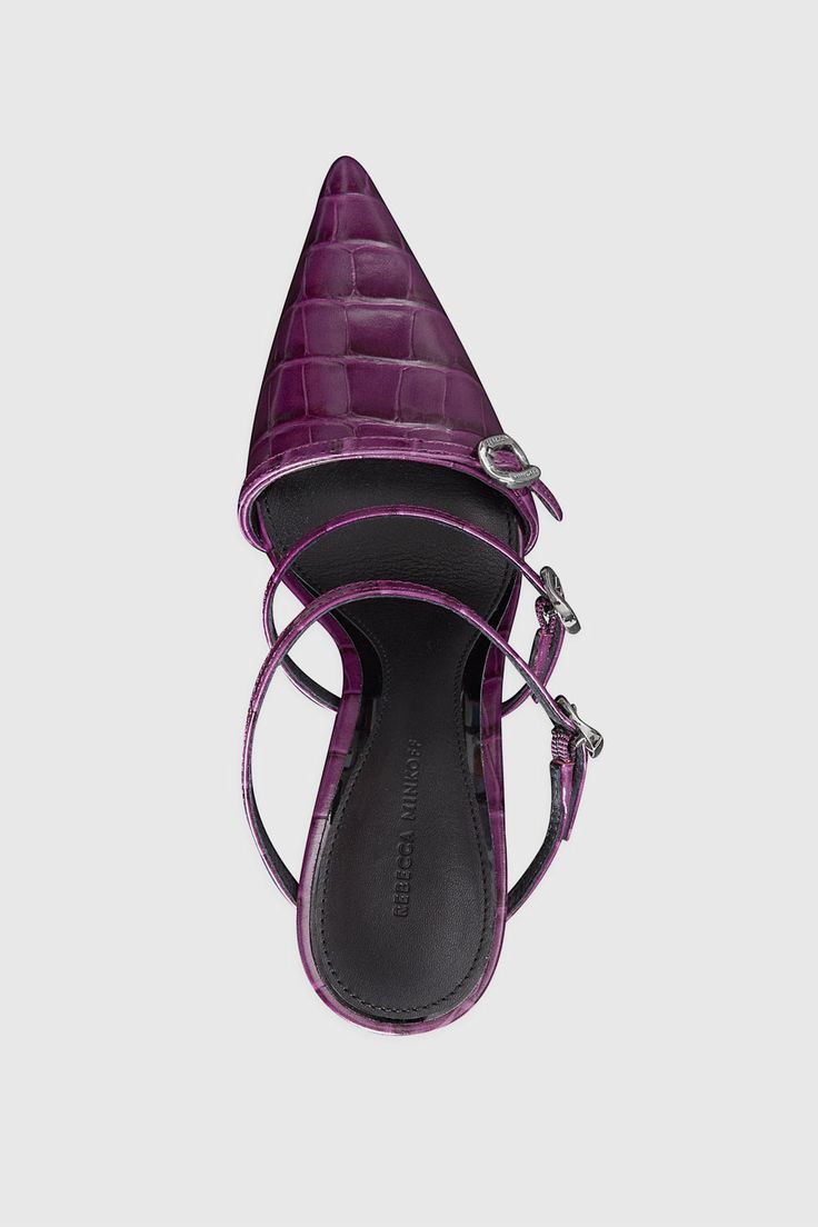 Make a bold statement with the Mule with Buckles. Featuring a high heel and standout buckle details, this mule is crafted from premium leather with a pointed toe. The leather lining and sock provide comfort, ensuring you look and feel your best. Style# BUCKLEMLH94 Leather Crocodile Heel Height: 3. | Rebecca Minkoff Buckle Heeled Mule In Berry - Size 7.5 Designer Pointed Toe Sandals For Work, Modern Heels With Buckle Closure And Pointed Toe, Designer Heels With Heel Strap For Work, Calf Leather Mules With Heel Strap And Pointed Toe, Calf Leather Pointed Toe Mules With Heel Strap, Pointed Toe Calf Leather Mules With Heel Strap, Calf Leather High Heel Mules With Heel Strap, High Heel Calf Leather Mules With Heel Strap, Pointed Toe Calf Leather Heels With Buckle