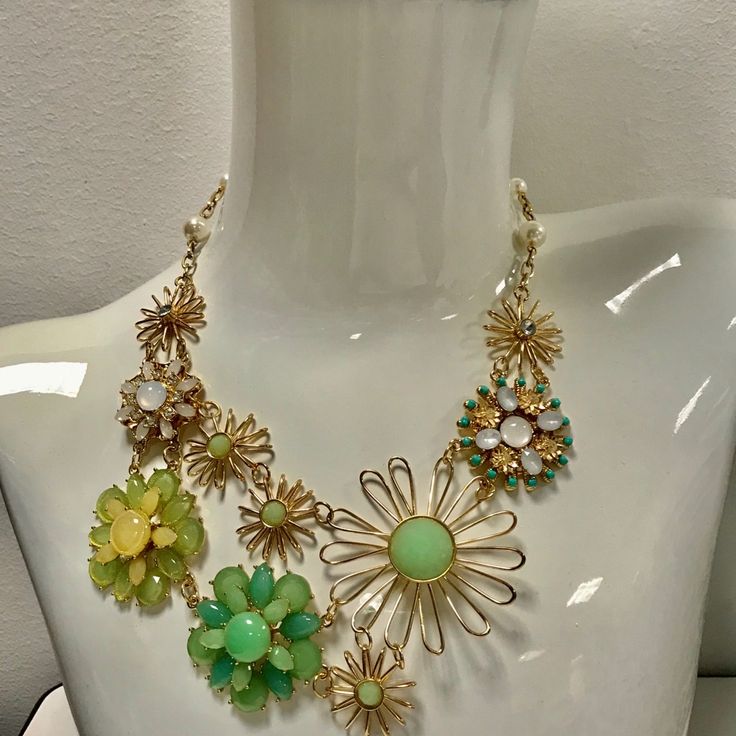 Love This Timeless 1980s-‘90s Statement Necklace. This Bouquet Of Beautiful Wire Sculpted Flowers Lies Amongst Flowers Of Soft Turquoise, Mint, White And Coral Petals. The Chain Features Graduated White Faux Pearls To Continue That Look Of Bold, Yet Feminine. This Statement Necklace Features Soft Beautiful Colors That Work As Great Neutrals. Vintage ‘90s But New (Leftover Store Inventory That Was Packed Away After A Location Move) 18” With An Adjustable 3” Flowers Vary In Size From 1”- 2” Acryli Green Spring Party Jewelry, Vintage Multicolor Jewelry For Spring, Multicolor Vintage Jewelry For Spring, Vintage Jewelry For Spring Party, Vintage Green Jewelry For Summer, Trendy Green Necklace For Spring, Elegant Green Necklace For Spring, Trendy Green Flower Shaped Necklaces, Spring Party Green Necklaces