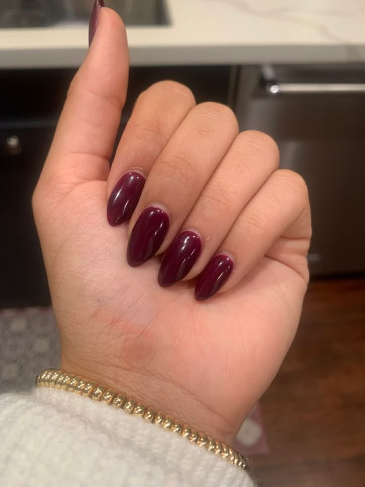 Maroon Acrylic Nails Almond, Dark Plum Acrylic Nails, Maroon Almond Shaped Nails, Dark Nail Colors Almond Shape, Dark Maroon Acrylic Nails, Wine Nails Almond Shape, Oval Nails Maroon, Almond Shape Maroon Nails, Acrylic Maroon Nails