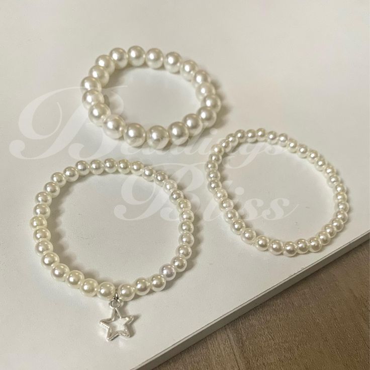 Cute minimalist Pearl bead bracelet 6mm or a 6mm bracelet with a star charm or a 10mm Pearl bead bracelet Bead Patterns Bracelet, Bracelets Minimalist, Pearl Bead Bracelet, Layering Bracelets, Bead Bracelets, Layered Bracelets, Star Charms, Jewelry Diy, Eras Tour