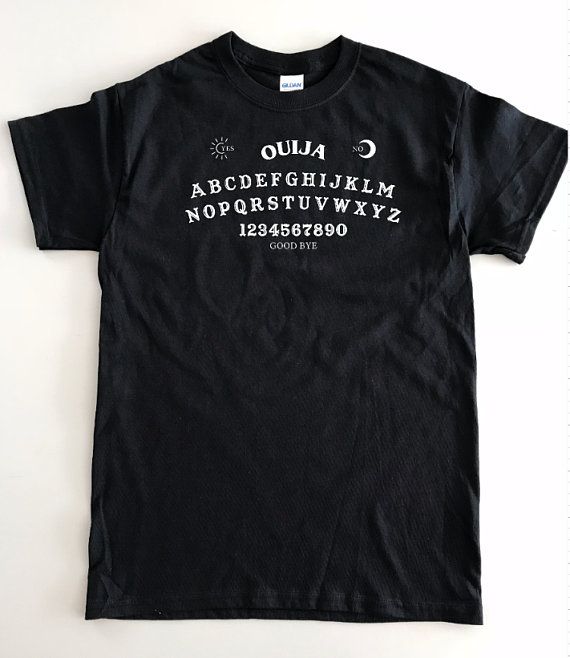 Ouija Board Shirt Halloween Shirt Witch Shirt Ghosts Goth Gothic Black T-shirt For Halloween, Halloween Cotton T-shirt With Text Print, Unisex Halloween T-shirt With Screen Print, Black Halloween T-shirt With Text Print, Halloween Cotton T-shirt With Letter Print, Halloween Letter Print Cotton T-shirt, Spooky Short Sleeve Shirt With Letter Print, Black Spooky Crew Neck Top, Black Short Sleeve Top For Halloween