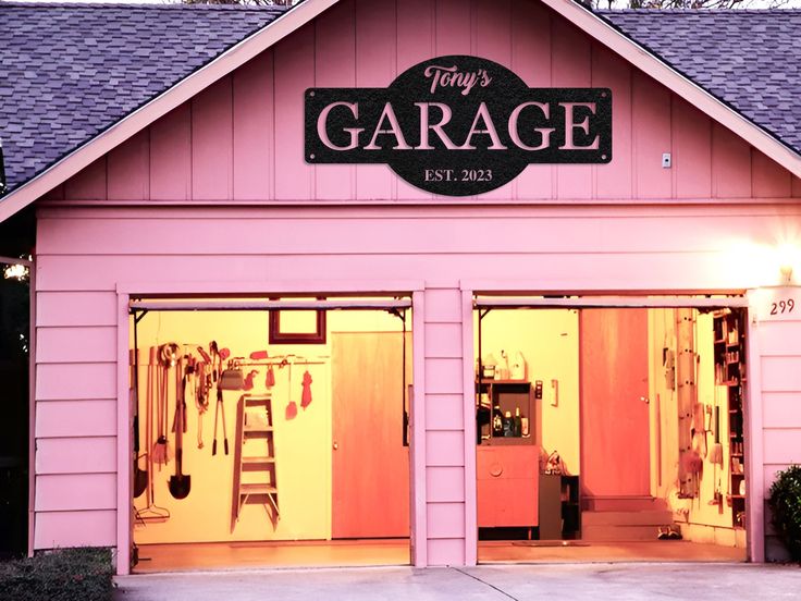 the garage is pink and has two doors that are open to let people know what's inside