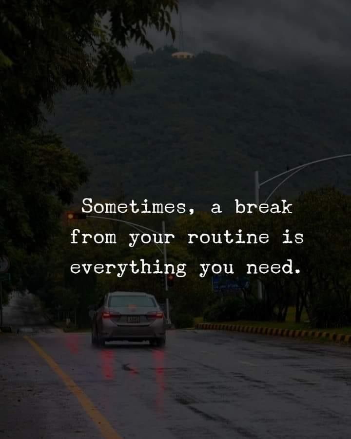 a car driving down a rain soaked road with the words sometimes, a break from your routine is everything you need