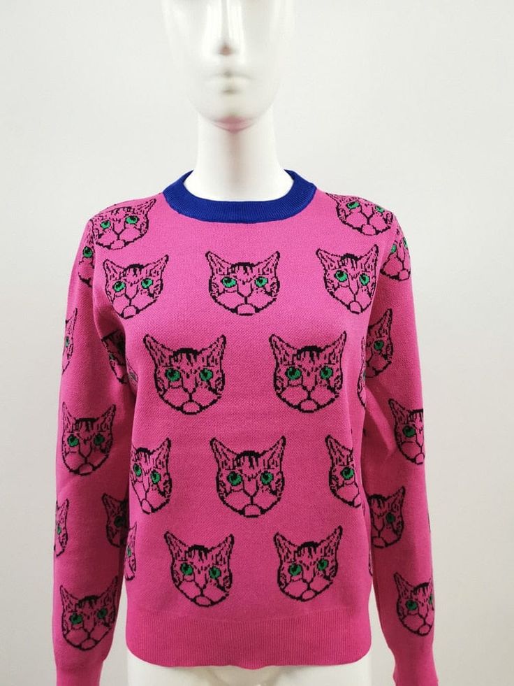 Elevate your cold weather wardrobe with our stylish women's sweater featuring adorable cats and long sleeves. Made with warm and comfortable fabric, this sweater is perfect for any occasion. Stay cozy and on-trend with this fashionable addition to your closet. Pattern Type: Cartoon Clothing Length: Regular Material: Polyester Material: Acrylic Collar: O-Neck Origin: US(Origin) Season: Spring/Autumn Decoration: NONE Sleeve Length(cm): Full Sleeve Style: Regular Thickness: STANDARD Style: Casual P Fall Crew Neck Sweater With Cat Design, Crew Neck Sweater With Cat Design For Fall, Casual Winter Tops With Cat Print, Winter Sweater With Cat Design, Winter Cat Print Crew Neck Sweater, Trendy Soft Knit Winter Sweater, Spring Soft Knit Long Sleeve Sweatshirt, Cozy Fit Sweater, Cozy Fit Winter Sweater For Loungewear