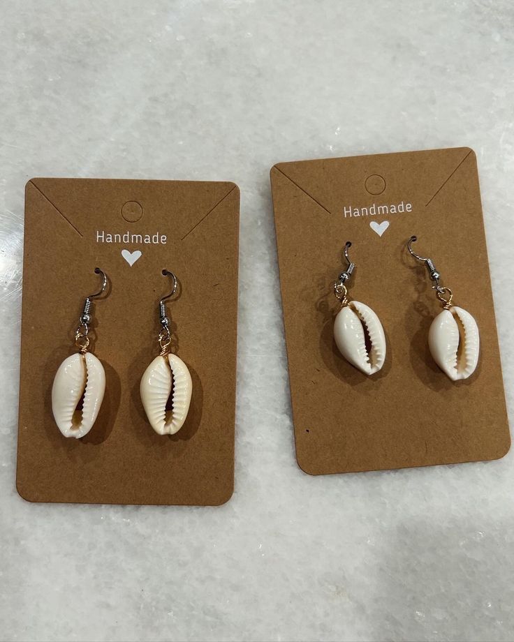 These are handmade Puka Shells. These earrings are perfect for any occasion. They are also lightweight. I love the beach and enjoy all the wonderful shells in Florida so I put them to good use! I hand make all of my products. Handmade Cowrie Shell Earrings For Gift, Handmade Cowrie Shell Earrings As Gift, Bohemian Shell Earrings For Gift, Handmade Casual Shell Jewelry, Casual Handmade Shell Jewelry, Handmade Ocean-inspired Earrings For Beach Season, Cowrie Shell Dangle Earrings As Gift, Bohemian Shell-shaped Earrings For Gift, Handmade Dangle Earrings For Beach Season