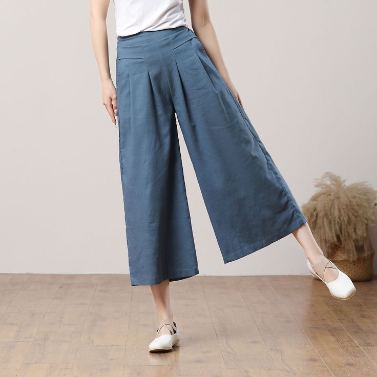 "Cool and comfortable for hot summer days, this blue wide leg pants is elegant and stylish.    It is a wonderful wardrobe staple that's a timeless classic you'll wear again and again.  All our items are Tailored and Handmade and Made to Order ,I can make Any Size . I design new styles every week, please collect my store. I believe that you will meet your favorite styles. ★★FEATURES 100% cotton Two side pockets Back elastic waist Wide leg pants Blue pants Casual pants Long pants Loose pants Plus Summer Cotton Solid Color Capris, Summer Solid Color Cotton Capris, High Waist Solid Color Harem Pants For Summer, Casual Blue Wide Leg Harem Pants, High Waist Solid Color Pants For Summer, Trendy Summer Harem Pants With Pockets, Non-stretch Summer Ankle-length Harem Pants, Summer Ankle-length Solid Color Harem Pants, Solid Color High-waisted Harem Pants For Spring