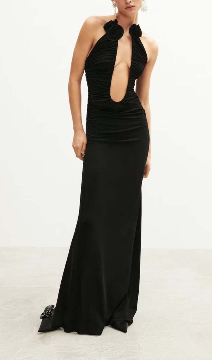 Make a bold entrance in this stunning black maxi dress featuring a plunging halter neckline that highlights your décolletage. The lightweight, flowy fabric hugs your curves before cascading down in an elegant maxi length. Cinch in your waist with the included belt for a figure-flattering silhouette. With its sexy yet sophisticated style, this jaw-dropping dress is perfect for a night out dancing or a formal event. Gentle Dry Clean Only Colour may vary due to lighting on images. The product image Black Floor-length Halter Dress For Night Out, Black Floor-length Halter Evening Dress, Black Halter Dress With Back Opening For Evening, Black Floor-length Halter Dress For Gala, Black Floor-length Backless Dress For Date Night, Black Halter Maxi Dress For Party, Black Halter Maxi Dress For Night Out, Black Ruched Halter Neck Maxi Dress, Black Maxi Length Halter Dress For Party