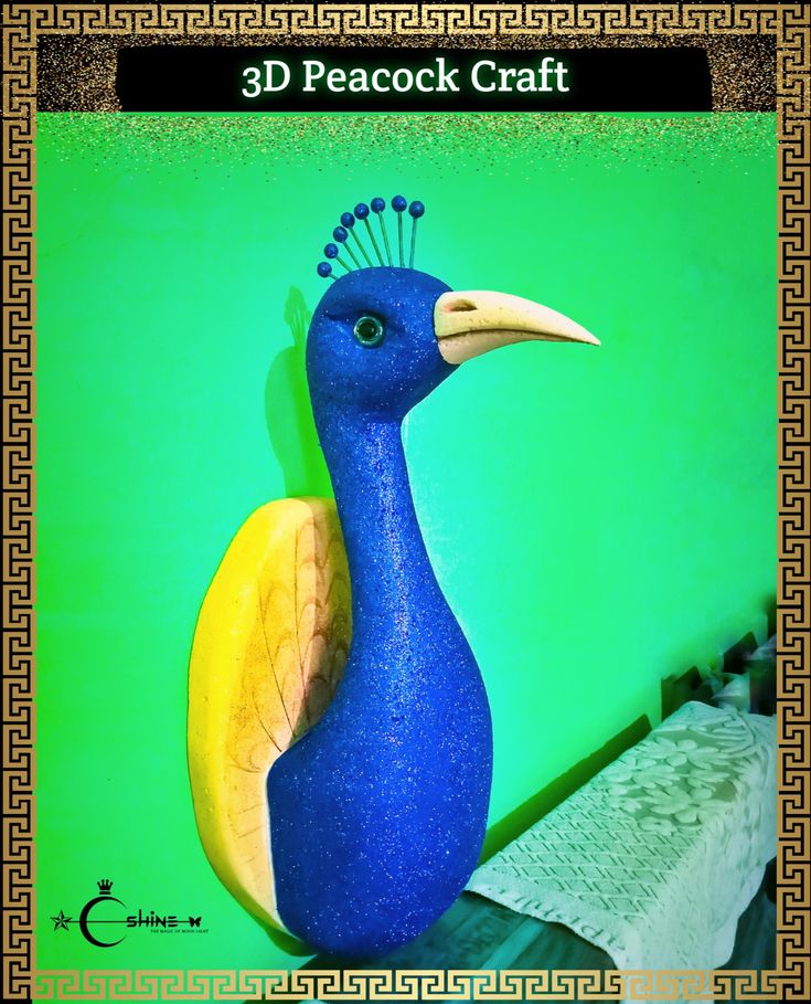 a blue bird with a yellow beak is sitting on a green surface and has an intricate border around it