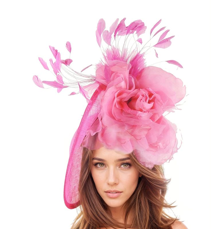 Hats By Cressida Kentucky Derby & Ascot Fascinator Hats Fuchsia Pink Ariel Sinamay Feather & Silk Fascinator Gorgeous trimmed feathers surround large fuchsia pink silk rose  with a large saucer sinamay base Base measures about 12 inches wide Mounted with a matching headband. If you prefer a headband to match your hair, please make a note at check out what colour headband you want. Get ready to steal the show with the stunning Ariel Fascinator Hat! Perfect for any special occasion, this headpiece is the epitome of elegance and femininity. Its large saucer sinamay base, beautiful silk rose, and mass of feathers are sure to turn heads at the Kentucky Derby or Royal Ascot. Whether you're the mother of the bride or simply looking for a women's formal hat for an upcoming wedding, this derby race Pink Carnival Headpieces, Pink Headpieces For Carnival Party, Pink Carnival Headpieces For Party, Pink Carnival Party Headpiece, Pink Mini Hat With Short Brim, Pink Fascinator For Royal Ascot Races, Pink Headband Fascinator For Carnival, Elegant Pink Fascinator For Carnival, Pink Headband Fascinator For Races