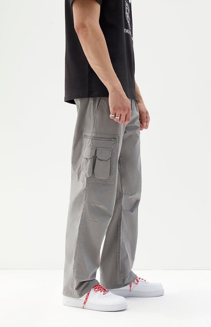 Casual meets cool with the new Stretch Gray Slim Cargo Pants from PacSun. This go-to pair is designed with an elastic stretch waistline, adjustable drawstrings, side pockets, zip cargo pockets, a drawcord hem, and a slim fit.


	Model is wearing size 32
	Model Measurements: 6'0” Height, 28” Waist, 32” Inseam


Learn more about PacSun eco items Summer Techwear Cargo Pants With Side Pockets, Casual Cargo Pants With Pockets For Outdoor, Urban Cargo Pants For Summer Outdoor Activities, Casual Cargo Pants For Outdoor, Urban Style Summer Cargo Pants For Outdoor Activities, Summer Streetwear Cargo Pants With Pockets, Straight Leg Cargo Pants With Elastic Waistband For Outdoor, Techwear Cargo Pants With Multiple Pockets For Summer, Baggy Gray Cargo Pants With Elastic Waistband