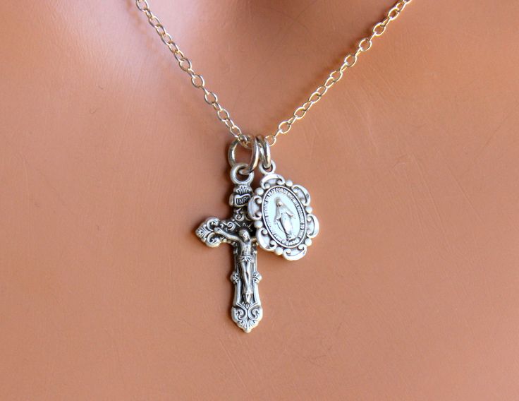 "This is a gold over 925 sterling silver Italian style Crucifix Cross Pendant along side a gold over 925 sterling silver Mother Mary Miraculous Medallion. Both pendants come together on a 14kt yellow gold filled cable chain. This is a an incredible piece of heirloom jewelry for women! These gorgeous charms are made by master silversmiths here in the USA. Such attention to detail these pendants are so exquisite that the photos do not do them justice! Cross measures 22x12mm and is clearly stamped Dainty Silver Crucifix Jewelry, Silver Necklace With Miraculous Medal For Wedding, Elegant Sterling Silver Necklace With Miraculous Medal, Sterling Silver Miraculous Medal Jewelry, Elegant Miraculous Medal Jewelry For Gift, Elegant Miraculous Medal Jewelry Gift, Silver Jewelry With Miraculous Medal For Gift, Sterling Silver Crucifix Jewelry For Wedding, Silver Crucifix For Wedding