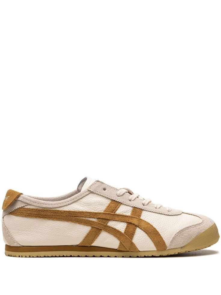 light beige brown leather signature Tiger stripes contrasting heel counter suede panelling round toe front lace-up fastening logo-print tongue branded insole rubber sole These styles are supplied by a premium sneaker marketplace. Stocking only the most sought-after footwear, they source and curate some of the most hard to find sneakers from around the world. Tiger Mexico 66, Onitsuka Tiger Mexico 66, Mexico 66, Aviator Watch, Balenciaga Track, Onitsuka Tiger, Brown Sneakers, Balenciaga Triple S, Tiger Stripes