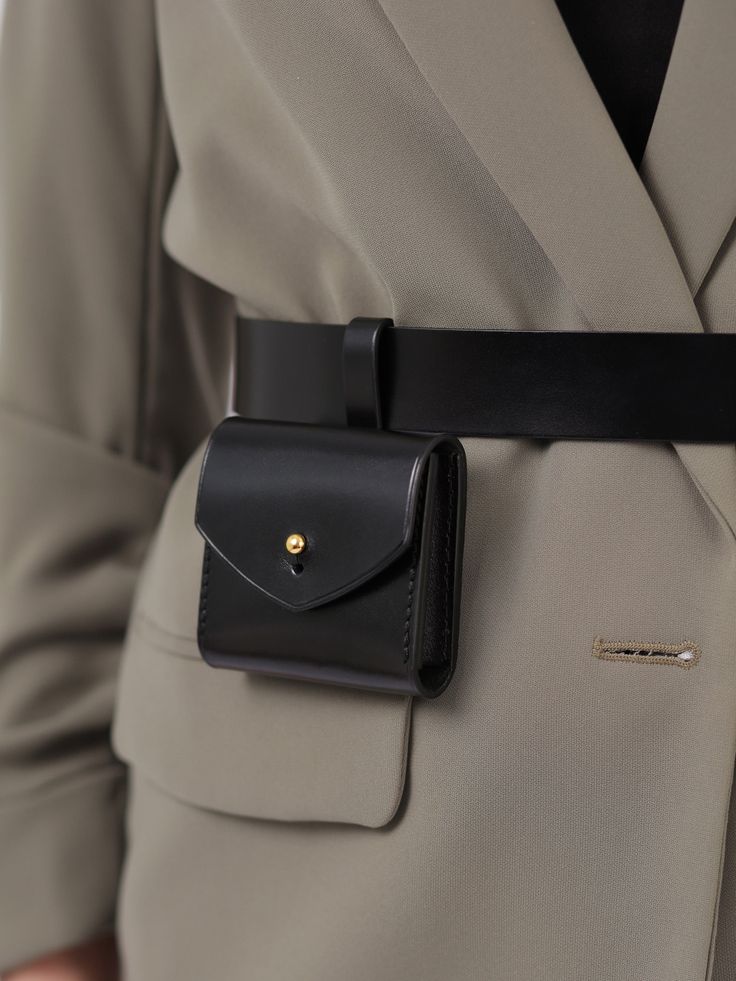 Made in a modern and minimalist aesthetic, the Micro Belt Bag is not only a fashion accessory but also a functional one. Although small, the stylish bag can hold your keys, coins or other small items. With its versatile design, the leather belt bag can be worn with a sporty jumpsuit for an edgy outfit or with a blazer for a chic, elegant look. Bag Size: Height- 7 cm, Width- 8 cm, Depth – 1.5 cm Waist belt width: 3 cm Adjustable using the buckle Designed to be fitted on the waist Diy Belt Bag, Waist Bag Leather, How To Tie Shoes, Edgy Outfit, Waist Purse, Collection Ideas, Soft Leather Handbags, Micro Bag, Leather Waist Bag