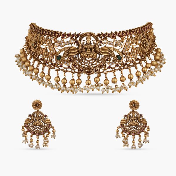 Shop Now: Tarinika's Temple Classic Antique Choker Set Luxury Round Temple Jewelry Sets, Intricate Design Choker For Receptions And Festivals, Intricate Design Choker For Reception And Festivals, Festive Temple Jewelry Choker For Reception, Ornate Kundan Necklace With Peacock Design For Wedding, Intricate Design Choker For Diwali Celebration, Festive Temple Necklace With Intricate Design Choker, Festive Intricate Temple Necklace Choker, Festive Intricate Design Choker For Celebration