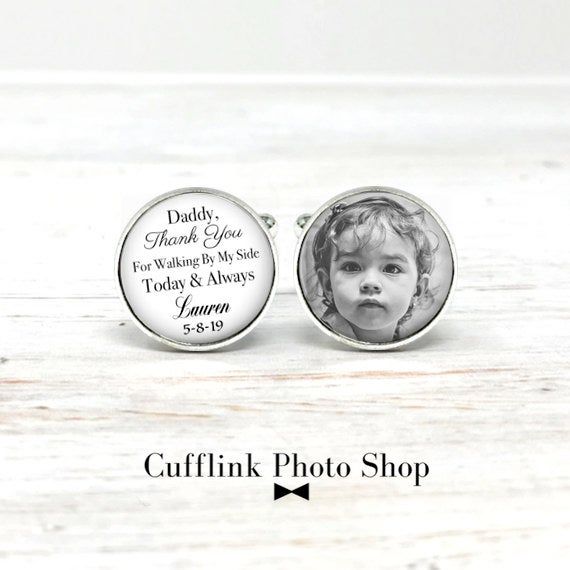 "\"Daddy Thank You For Walking By My Side\" & your wedding date and your first name on one cufflink and your personalized photo on the other. How to order: 1. Choose from the drop down menu if you want your photo in the original color or converted into black and white. 2. Choose your cufflink color. 3. Please leave me a message in the \"note to seller\" section of you invoice letting me know your wedding date and your first name. Please note - let me know if you want to change \"Daddy\" to \ Customizable Cufflinks For Father's Day Gift, Father's Day Wedding Gift Cufflinks With Engraving Option, Engraved Cufflinks For Wedding Gift On Father's Day, Customizable Cufflinks As A Father's Day Gift, Engravable Cufflinks For Wedding Gift On Father's Day, Personalized Silver Cufflinks For Gift, Personalized Silver Cufflinks As Gift, Silver Cufflinks With Engraving Option For Gift, Personalized Cufflinks For Wedding And Father's Day