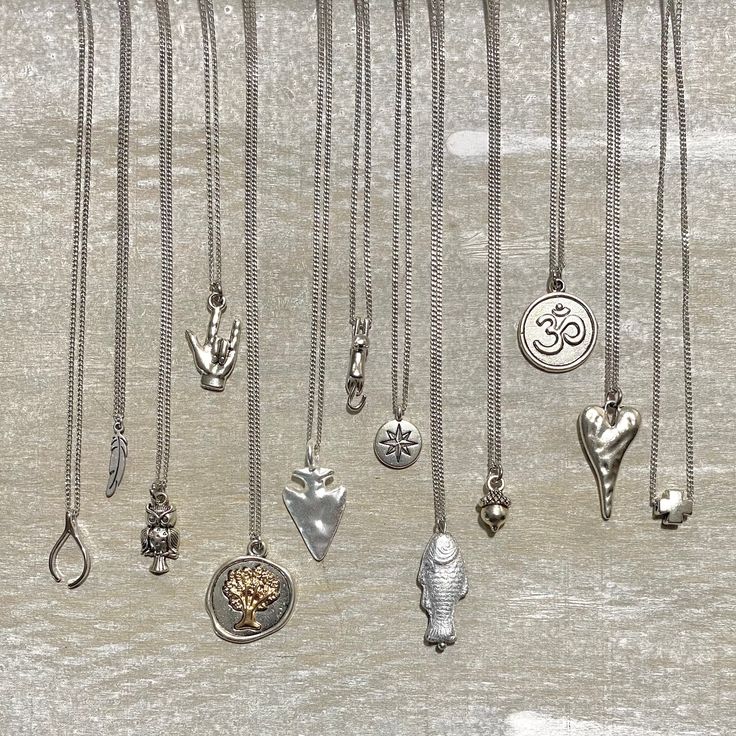 The lucky charm necklace is a boxed chain necklace perfect for layering, featuring cute jewelry charms in silver. This meaningful gift for her is ideal for cat lovers and makes a thoughtful present for a friend. 🪶 𝗠𝗔𝗧𝗘𝗥𝗜𝗔𝗟𝗦 + 𝗗𝗜𝗠𝗘𝗡𝗦𝗜𝗢𝗡𝗦 ❯ Silver-plated Chain + Matching Lobster Claw Clasp ❯ Silver-plated Charm 🪶 𝗗𝗘𝗦𝗜𝗚𝗡 + 𝗘𝗡𝗘𝗥𝗚𝗘𝗧𝗜𝗖 𝗠𝗘𝗔𝗡𝗜𝗡𝗚 -- Each charm represents a a different blessing (see descriptions below), and comes attached to a card with the name Meaningful Gifts For Her, Lucky Charm Necklace, Boho Chic Necklace, Necklace Trendy, Talisman Necklace, Layering Necklaces, Mother Daughter Gifts, Layered Necklaces Silver, Tree Of Life Necklace