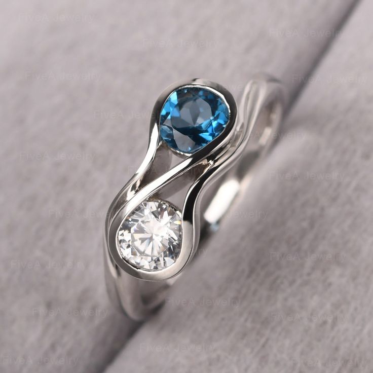 ◆ The ring is handcrafted from sterling silver and decorated with a dazzling 5*5 mm London blue topaz and CZ. It is suitable for engagement/anniversary/daily occasion. ◆ Production Description: Main stone Type: Real London blue topaz and Cubic Zirconia (2 stones can change to what you want) Main Stone Shape: Round Cut Main Stone Size: 5*5 mm(0.56ct & 0.88ct) Side stone: None Metal: 925 Sterling silver - Other options available in the drop down menu ◆ Customization: √Free for Add Engraving √Other Blue Topaz Ring With Tension Setting For Promise, Diamond White Topaz Ring With Accent Stones For Anniversary, Promise Ring With Blue Topaz, Silver Topaz Birthstone Ring For Anniversary, Diamond Topaz Ring With Tension Setting For Anniversary, Promise Diamond Ring With Blue Topaz Center Stone, Blue Topaz Birthstone Ring With Accent Stones For Promise, Topaz Birthstone Ring With Brilliant Cut For Gift, Sterling Silver Topaz Ring With Center Stone For Promise