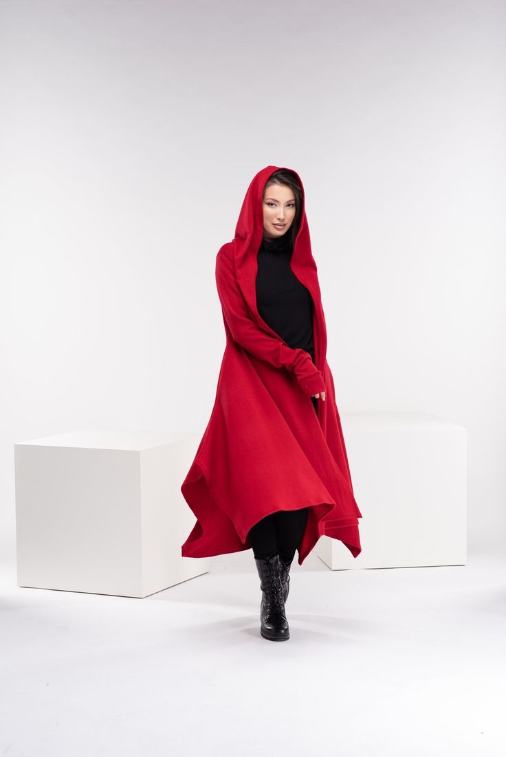 "This asymmetrical and modern cloak with hood has two side pockets, a super comfy hood, and thumb holes for a fabulous look. If you want to add a belt to the cloak, please add this listing to your order, and choose from the options: https://www.etsy.com/listing/1309043791/customization-add-a-belt-to-the-cloak?ref=listings_manager_grid The model in the picture is 170cm. ⅼ 5.7 ft. tall and is wearing size XS/color: red 🌟 INFO: * Worldwide EXPRESS shipping - please provide a phone number for shipp Cloak With Hood, Cyberpunk Cosplay, Red Cloak, Long Sweater Coat, Wide Leather Belt, Wool Cape, Hooded Cloak, Designer Drapes, Long Sweater