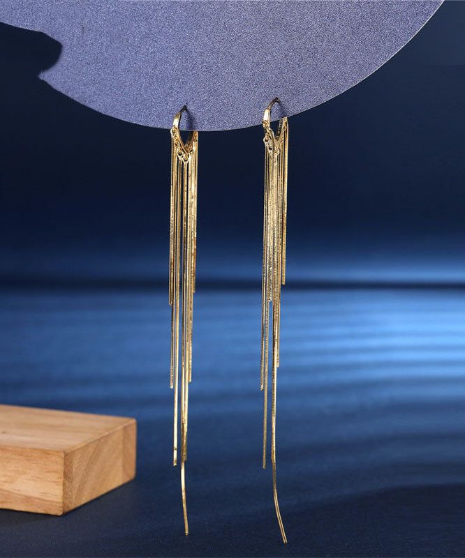 Skinny Gold Copper Overgild Tassel Drop EarringsMade of fine Copper Overgild Tassel.Measurement: 12cm/4.68" * 1cm/0.39". Matches easily with daily hairstyle, dresses & Shirts Elegant Gold Fringe Chandelier Earrings, Elegant Gold Chandelier Earrings With Fringe, Gold Fringe Metal Chandelier Earrings, Gold Fringe Chandelier Earrings As Gift, Gold Fringe Chandelier Earrings, Gold Tassel Earrings For Party, Gold Dangle Tassel Earrings For Wedding, Gold Elegant Tassel Earrings For Party, Elegant Gold Metal Tassel Earrings