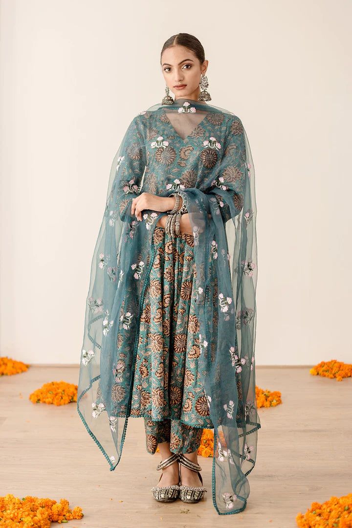 Introducing this exquisite Pure Cotton Green Floral Printed Anarkali Suit Set - the perfect choice for creating a sublimely stylish look. Expertly crafted from cotton, its delightful floral print sets it apart as a truly luxurious piece for summer evenings and garden parties. Comfortably flattering, it makes a timelessly tasteful style statement. No. of set : 3 pieces Color : Green multicolor Fabric : Pure Cotton Kurta Length : 40 inches Pant Length : 38 inches Washing Instructions : Dry Clean Gulabo Jaipur, Printed Anarkali, Cotton Anarkali, Cotton Kurta, Sharara Set, Organza Dupatta, Anarkali Suit, Garden Parties, Pant Length