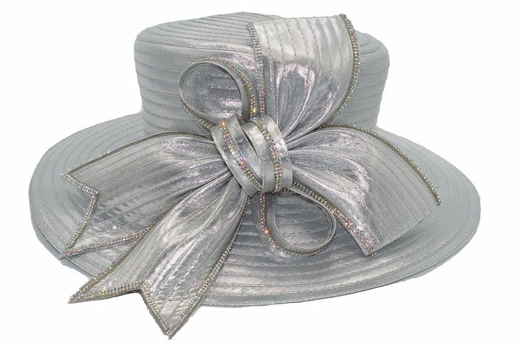 Shop, Save and Be Rewarded Lady Diane Deluxe Church Hat Style: HF202 Elegant bow adorned hat featuring stone embellishment Available in 8 Colors One size fits most contains a string inside to tighten a little if needed Sign Up For Rewards Program just go to the icon on left side of this page Follow the instructions, it's quick and easy Formal Hat With Adjustable Bow, Formal Adjustable Hat With Bow, Formal Hats With Bow And Adjustable Fit, Silver Wide Brim Hat For Kentucky Derby, Adjustable Curved Brim Hat With Ribbon, Adjustable Hats With Bow For Wedding, Adjustable Wedding Hats With Bow, Party Hat With Ribbon And Short Brim, Adjustable Hat With Ribbon For Kentucky Derby