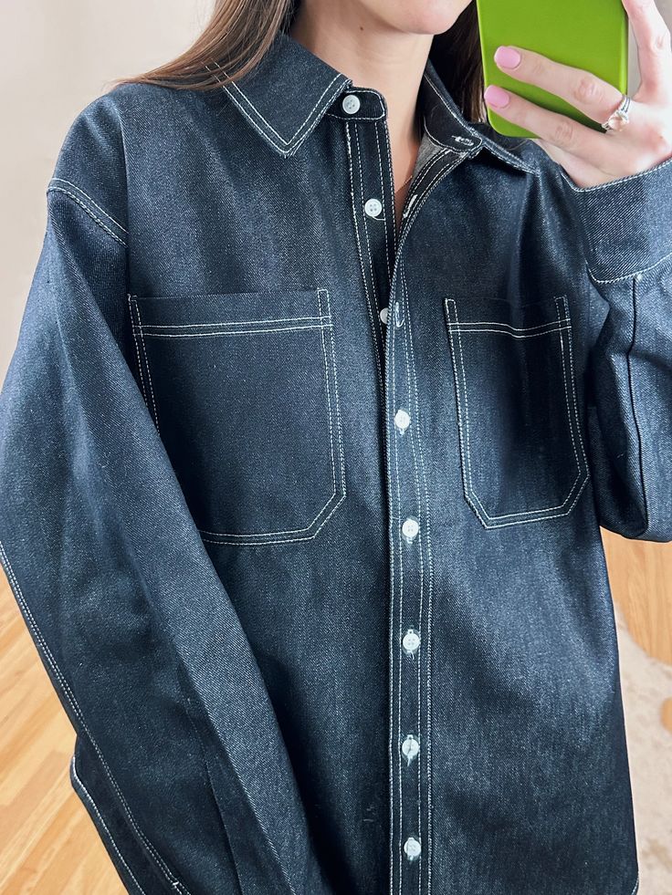 Meet your new go-to shacket! Throw on this oversized, dark wash denim button up over a dress or your favorite pair of jeans to add a chic flair to any outfit! Can even be worn as a dress if you're more petite. Have a little Canadian Tux moment and pair it with our Classic Dark Wash Jeans.100% Cotton Maclaine is 5'7 and wearing a size S/M. Dark Wash Cotton Shacket For Fall, Fall Dark Wash Denim Top With Pockets, Chic Fall Denim Top With Pockets, Dark Wash Denim Top With Buttoned Pockets For Fall, Fall Dark Wash Denim Top With Buttoned Pockets, Trendy Dark Wash Denim Top With Pockets, Chic Dark Wash Relaxed Fit Denim Jacket, Chic Dark Wash Denim Top With Pockets, Utility Cotton Denim Top For Fall