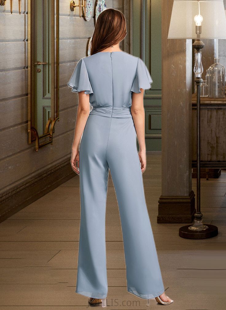 Aniyah Jumpsuit/Pantsuit V-Neck Floor-Length Chiffon Bridesmaid Dress With Ruffle UKP0016524 Neckline:: V-neck Length:: Floor-Length Embellishment:: Ruffle Fabric:: Chiffon Straps:: Sleeves Sleeve:: ShortSleeves BackStyle:: ZipperUp FullyLined:: No Built-InBra:: Yes Boning:: No Size:: General,Plus Season:: Spring,Fall PlusSizeModelInformation:: ModelName:KatyHeight:5.7ft（173cm）Bust:42in（107cm）Waist:42in（82cm）Hips:46in（116cm） Silhouette:: Jumpsuit/Pantsuit PlusSizeModel'sDressSize:: CustomSize Mo Chiffon V-neck Jumpsuits And Rompers For Party, Fitted Floor-length Jumpsuits For Banquets, Fitted V-neck Jumpsuit For Wedding Guests, Fitted Solid Color Jumpsuit For Wedding, Elegant Full-length Solid Jumpsuits And Rompers, Elegant Full Length Solid Color Jumpsuit, Elegant Blue Pantsuit For Wedding, Elegant Blue Wedding Jumpsuits And Rompers, Floor Length Chiffon Bridesmaid Dresses