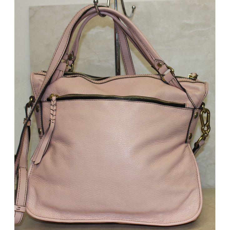 This pastel pink Oryany hobo bag measures approximately 12” x 13” x 4”. It is a used bag with minimal wear and a scuff on the bottom. Please closely inspect all photos before purchasing. Closure: Zip Strap Drop: 24” Color: Pink Pockets: 5 Interior & 2 Exterior Material: Leather Style: Crossbody Bag Photos are Actual pictures, not stock photos. Authenticity Note: We have been trained to spot fake designer bags, and closely inspect each purse to verify authenticity. If we have any doubts, we NEVER Pink Hobo Bag With Zipper For Daily Use, Pink Tote Hobo Bag For Errands, Pink Hobo Bag With Zipper Closure For Shopping, Pink Hobo Bag With Zipper For Everyday, Everyday Pink Hobo Bag With Top Handle, Pink Top Handle Hobo Bag For Travel, Pink Crossbody Hobo Bag For Daily Use, Pink Hobo Bag For Daily Use, Pink Hobo Shoulder Bag For Errands