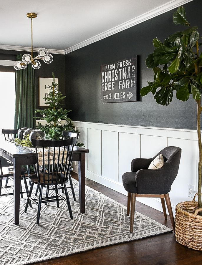 the dining room is decorated in black and white