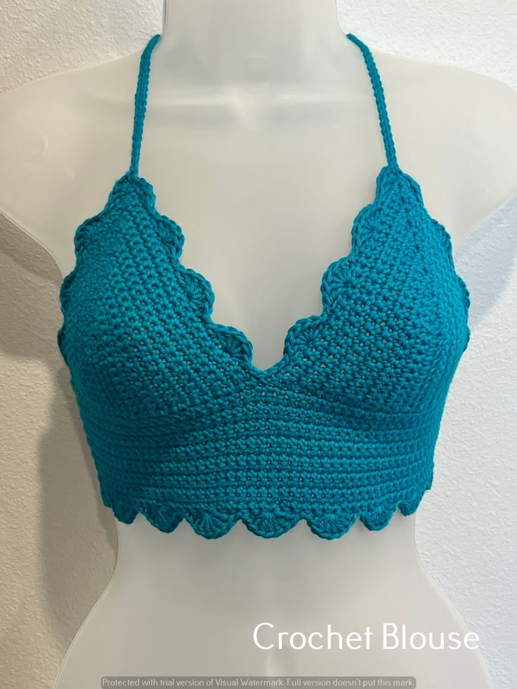 a crochet bra top is shown on a mannequin