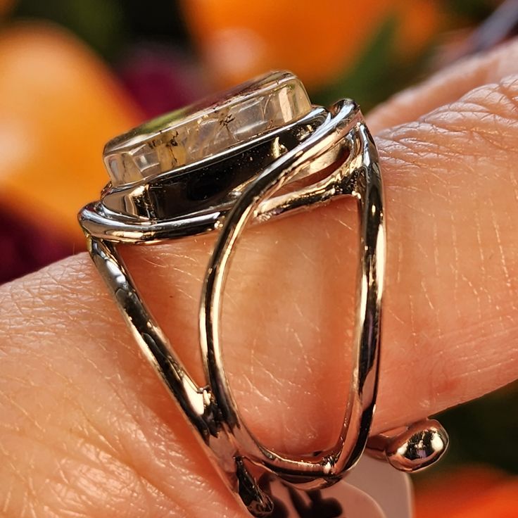 Absolutely beautiful Dendritic Girasol Quartz with Golden Healer Finger Cuff Adjustable Ring in .925 Sterling Silver. Adjustable ring fits sizes 4-11. This beautiful, high quality Dendritic Girasol Quartz was hand picked with intention just for you by Rick and Jamie. ~Dendritic Quartz Metaphysical Properties~ ♡ Chakra: All ♡ Element: All ♡ Numerology: 9 ♡ Zodiac Sign: All ♡ Master healer that is programmable for any intention ♡ Enhances connection with the Earth & grounding ♡ Promotes spiritual Adjustable Silver Jewelry With Natural Inclusions, Sterling Silver Jewelry With Natural Inclusions For Anniversary, Elegant Sterling Silver Jewelry With Natural Inclusions, Nickel-free Open Band White Gold Jewelry, Adjustable Polished Jewelry For Anniversary, Adjustable Open Ring With Polished Finish, Nickel Free White Gold Open Band Jewelry, Formal Citrine Open Ring Jewelry, Nickel-free White Gold Open Band Jewelry