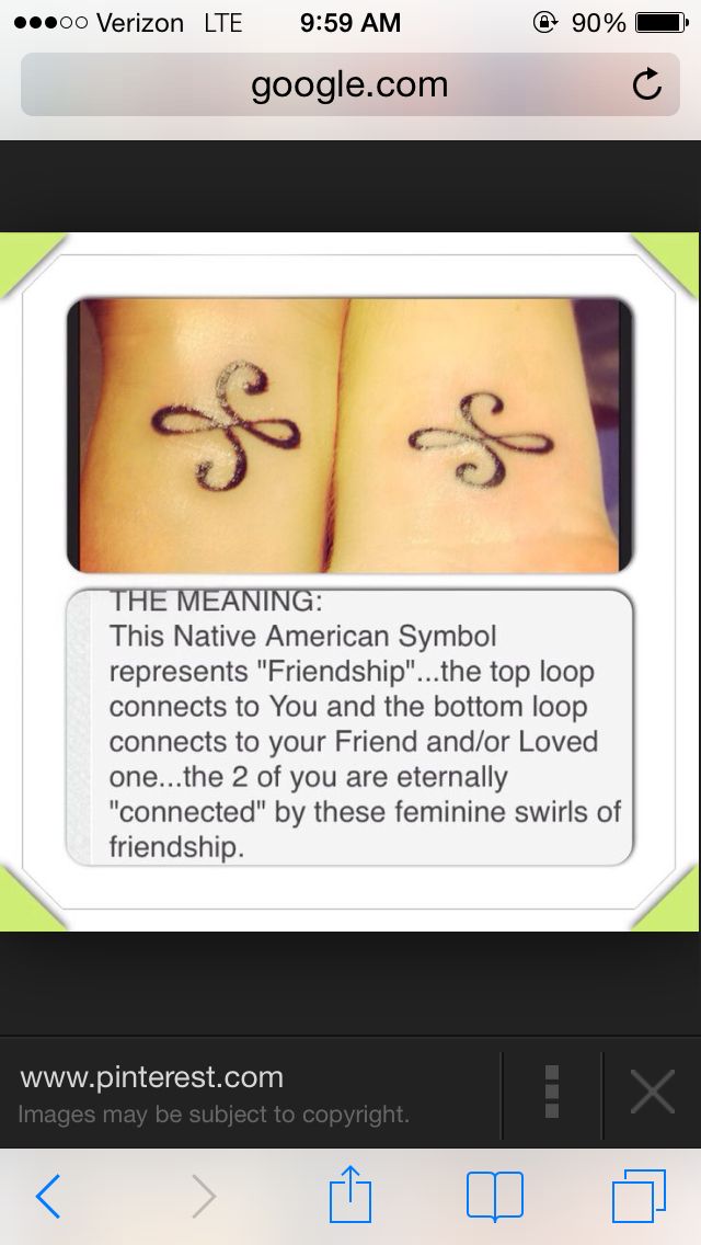 two small tattoos on the back of their hands, one is an amp symbol and the other