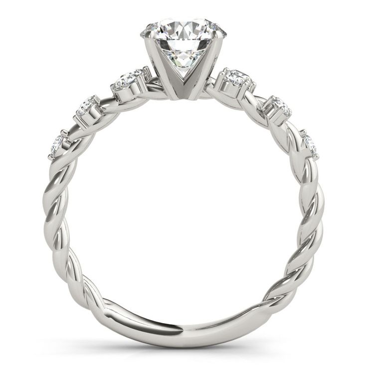 a white gold engagement ring with diamonds on it