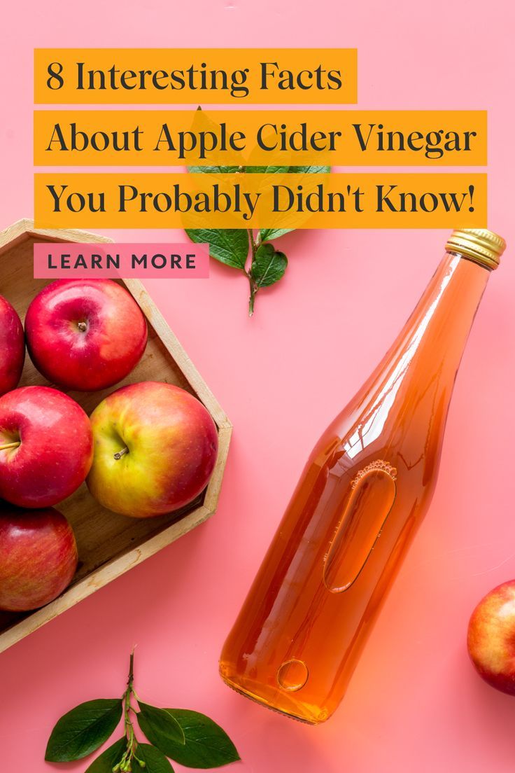 an apple cider and some apples on a pink background with the words 8 interesting fact about apple cider vinegar you probably didn't know