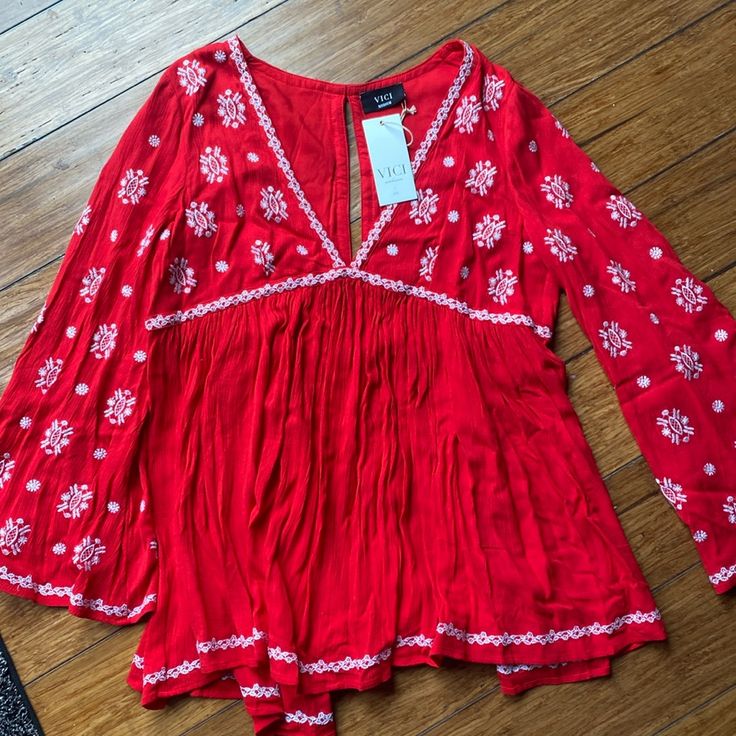 Nwt Beautiful Boho Embroidered Top. Perfect Condition. Size M. Red Bohemian Embroidered V-neck Top, Red Embroidered V-neck Blouse, Red Long Sleeve Cotton Embroidered Top, Casual Red Tops With Embroidered Hem, Long Sleeve Embroidered Top For Summer, Red Embroidered Hem Top For Summer, Red V-neck Blouse With Floral Embroidery, Red Chikankari Embroidery Top For Festive Occasions, Festive V-neck Summer Tops