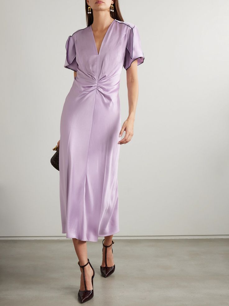 Timeless and feminine, this dress effortlessly captures the essence of Victoria Beckham's Fall '24 collection. It's cut from fluid satin in a draped midi silhouette and gathered at the front to create a deep V-neckline. The 'Petunia' shade is perfect for summer weddings and garden parties. Spring Pre-draped Silk Midi Dress, Pre-draped Satin Midi Dress For Spring, Silk Midi Dress With Folds For Cocktail, Elegant Knee-length Midi Dress With Folds, Elegant V-neck Midi Dress With Folds, Elegant Silk Dresses With Folds, Fitted Silk Midi Dress With Folds, Feminine Draped Midi Dress For Formal Occasions, Formal Feminine Draped Midi Dress