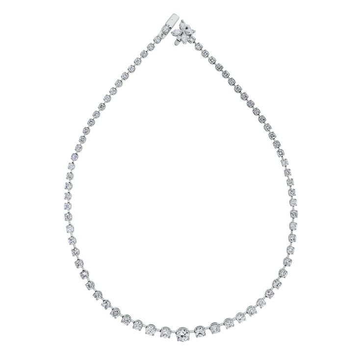 A classic and elegant everyday or occasional wear with graduating diamond sizes, this Space Necklace is a fresh take on a versatile piece of jewelry. All our necklaces have two locks for added security. Center Diamond Weight: 1.00 ct Center Diamond Color: I Center Diamond Clarity: SI (Slightly Included) Total Diamond Weight: 11.53 ct No. of Diamonds: 77 Diamond Color: H - J Diamond Clarity: SI - I (Slightly Included - Included) Metal: Platinum Metal Wt: 32.15 gms Setting: Prong Set Length: 15.75 Fine Jewelry Single Strand Diamond Necklace, Classic Round Diamond Bridal Necklace, Formal Single Strand Round Cut Diamond Necklace, Classic Single Strand Round Diamond Necklace, Timeless Diamond Solitaire Necklace Single Strand, Timeless Diamond Solitaire Single Strand Necklace, Classic Round Single Strand Diamond Necklace, Classic Round Cut Diamond Bridal Necklace, Elegant Single Strand Diamond Necklace