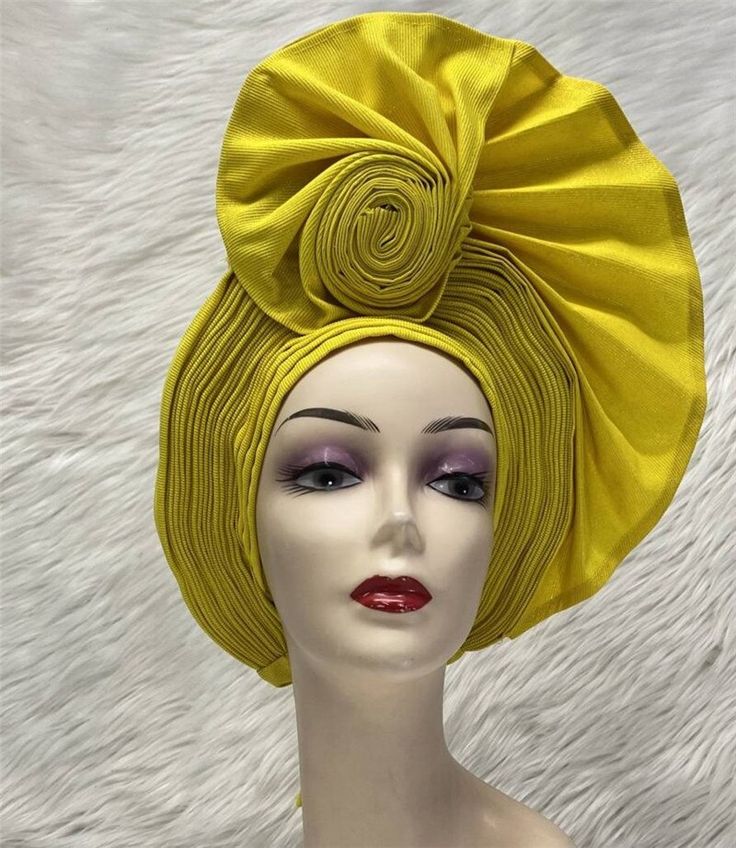 This Sego Gele Headtie Turbans for Women Hats is a must-have for any fashionista. It is made from 100% cotton and features an embroidered design. The width is 1 and it is eco-friendly. It is made in Guangdong, Mainland China. This headtie is already made and ready to wear. It is perfect for any special occasion or just to add a touch of style to your everyday look. It is sure to make a statement and turn heads wherever you go. This Sego Gele Headtie Turbans for Women Hats is a great way to add a Yellow Headband Headwrap For Summer, Yellow Summer Headwrap Headband, Yellow Summer Headband Headscarf, Yellow Summer Headband Headwrap, Summer Yellow Headwrap Headband, Yellow Summer Headband Wrap, Adjustable Yellow Headwrap For Spring, Yellow One Size Headband Headscarf, Yellow Headband Headscarf