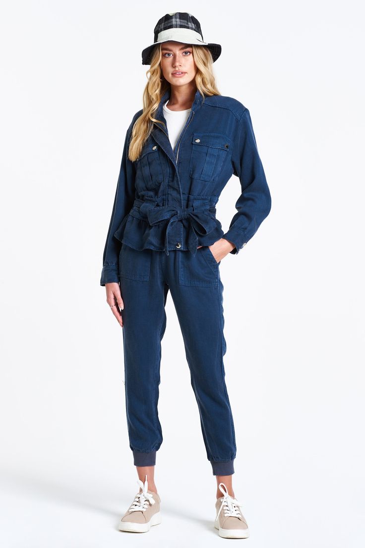 Drop shoulder jacket with front patch pockets and cinched waist. Versatile jacket for anywear is a MUST add to wardrobe! Solid color woven on relaxed fit.Body length from HPS: 23 1/2", Sleeve length: 22", Bust: 44" (Size Small) 100% TENCEL Machine wash cold, Tumble dry low Imported Blue Utility Denim Jacket With Patch Pockets, Denim Blue Utility Jacket With Patch Pockets For Work, Blue Outerwear With Pockets And Relaxed Fit, Utility Style Washed Blue Outerwear For Work, Utility Style Washed Blue Workwear Outerwear, Blue Cotton Denim Jacket With Multiple Pockets, Casual Washed Blue Utility Jacket With Pockets, Blue Utility Jacket With Pockets And Relaxed Fit, Cotton Denim Jacket With Cargo Pockets For Work