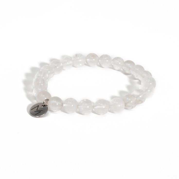 This crystal bracelet is made of natural Clear Quartz. Our Crystal Bracelets are designed to feel lightweight, comfortable, and effortless. Stringing each crystal beads is part of our mindful Intention when we create this bracelet, infusing positive energies, love, and happiness within each design.By combining meaningful symbols and natural crystals, we give this accessory relevance in every way. Clear Quartz | Clarity, Awareness & HealingClear Quartz is a stone with immense power and is oft Adjustable Round Beads Crystal Bracelet, Rose Quartz Round Crystal Bracelet For Meditation, Rose Quartz Crystal Bracelet For Meditation, Rose Quartz Bracelet For Meditation, Rose Quartz Crystal Bracelet With Natural Stones, Round Rose Quartz Crystal Bracelet For Relaxation, Round Rose Quartz Crystal Bracelet With Natural Stones, Adjustable Rose Quartz Crystal Bracelet Spiritual, Adjustable Rose Quartz Crystal Bracelet, Spiritual Style