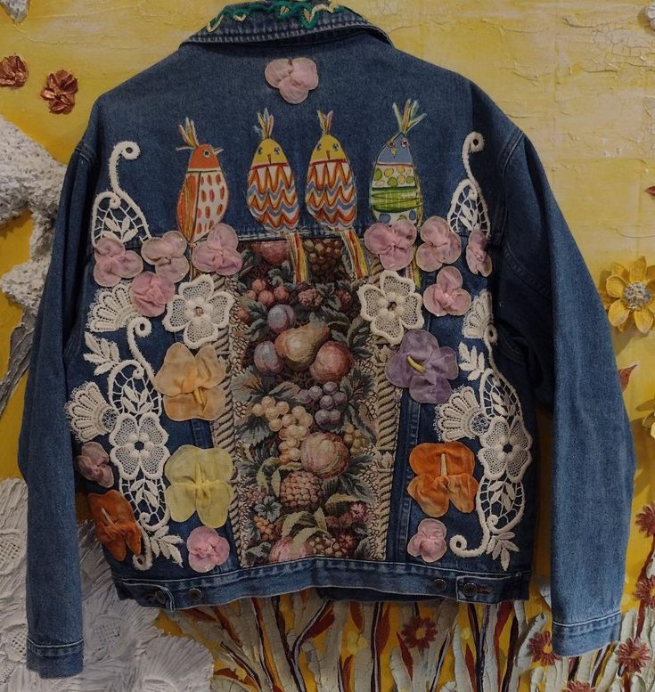 Unique, one of a kind jean Jacket large size long sleeve. Signed by the artist inside the jacket, embroidery, art works on front and back. Oversized Long Sleeve Denim Jacket With Patches, Long Sleeve Denim Jacket With Floral Embroidery For Fall, Floral Embroidery Long Sleeve Denim Jacket For Fall, Floral Embroidered Long Sleeve Denim Jacket For Fall, Embroidered Long Sleeve Denim Jacket For Fall, Embroidered Cotton Denim Jacket For Fall, Embroidered Denim Outerwear For Fall, Embroidered Denim Jacket For Fall, Fall Embroidered Denim Outerwear