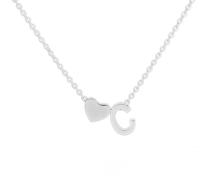 High-quality stainless steel gold and silver plated beautiful initial and tiny heart necklace. Our simple and yet elegant necklace is perfect as a gift for any special occasion (Valentine's Day gift, Birthday gift, Mother's day gift, graduation gift, Bridesmaid gift, friendship gift) Our Personalized initial-heart necklace is a special gift to remember someone who is important in your life. It measures 16 in with 2 in extension (total of 18 in). You can select from one to four initials to go wit Silver Heart Initial Necklace For Valentine's Day, Silver Heart Initial Necklace For Mother's Day, Silver Initial Pendant Necklace With Heart Charm, Personalized Silver Initial Necklace With Heart Charm, Silver Heart Initial Necklace As Personalized Gift, Silver Heart Initial Necklace For Personalized Gift, Valentine's Day Necklace With Initial Pendant, Silver Heart Pendant Initial Necklace For Mother's Day, Silver Heart Initial Necklace Perfect For Gifts