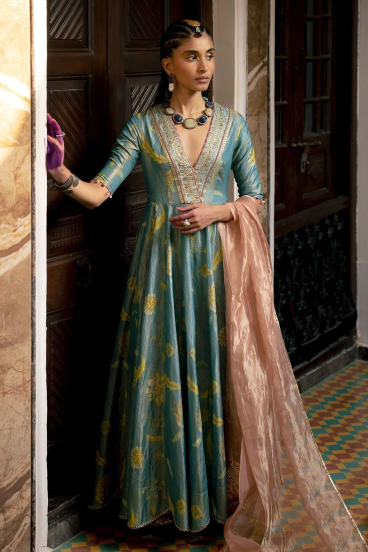 Shop for these amazing collections of Blue Anarkali: Tissue Silk Printed And Embroidered Floral With Dupatta For Women by Rajiramniq online at Aza Fashions. Luxury Anarkali Style Embroidered Fabric With Zari Work, Luxury Embroidered Tussar Silk Anarkali Set, Luxury Silk Thread Anarkali Set With Resham Embroidery, Luxury Katan Silk Anarkali Set With Zari Weaving, Luxury Anarkali Straight Kurta Embroidered Fabric, Luxury Raw Silk Unstitched Anarkali Suit, Luxury Block Print Anarkali Set With Traditional Drape, Luxury Anarkali Blouse Piece In Dola Silk, Luxury Zari Weaving Jamawar Anarkali Set