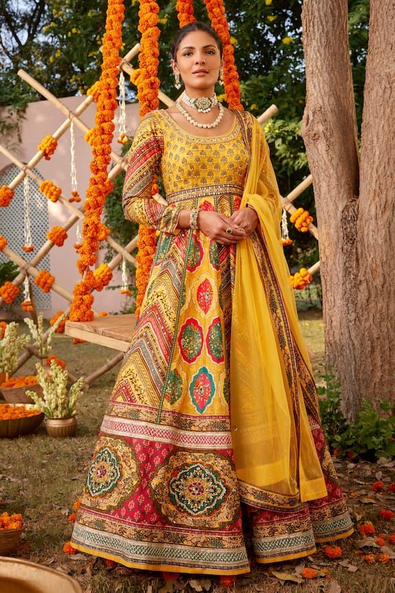 Yellow raw silk padded anarkali with attached can-can, contrast multi panels, all over multi color Mughal print, metallic adda, sequin, beads and gota hand embroidery. Paired with printed bordered dupatta. - Aza Fashions Anarkali Jamawar Sharara With Zari Work, Anarkali Style Sharara In Jamawar With Zari Work, Unstitched Anarkali Lehenga In Jamawar, Anarkali Jamawar Set With Zari Work, Traditional Drape Jamawar Anarkali Set With Zari Work, Traditional Draped Jamawar Anarkali Set With Zari Work, Anarkali Style Unstitched Jamawar Lehenga, Festive Anarkali Lehenga In Jamawar, Eid Anarkali Set With Zari Work In Jamawar