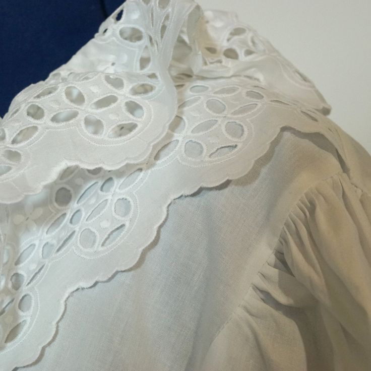 Very nice original folk blouse, with lovely lace embellishment. The blouse is old but in very good condition. The size is app. 48/XL Measurements: Bust: 122cm Waist: 114cm Length: 66cm Sleeve length: 64cm White Cotton Blouse With Lace Collar, Collared Cotton Blouse With Lace Trim, White Spring Tops With Lace Cuffs, Cotton Peasant Top With Lace Trim For Daywear, White Tops With Lace Trim And Peter Pan Collar, White Long Sleeve Blouse With Lace Collar, White Tops With Lace Cuffs For Spring, Fall Cotton Blouse With Broderie Anglaise, Bohemian Broderie Anglaise Blouse For Daywear