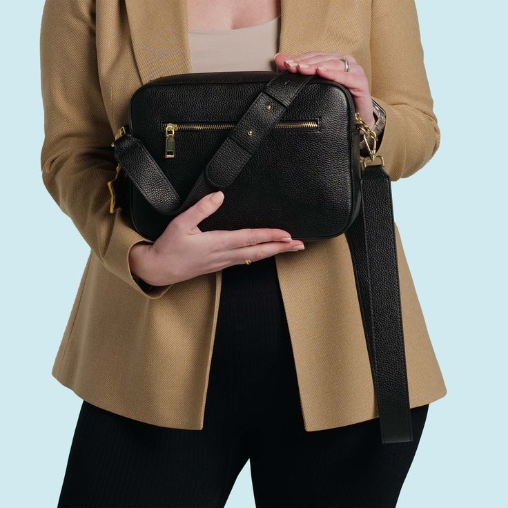 Stratford XL Crossbody Bag - Midnight Black This leather crossbody bag has the classic design and style of our Stratford bag, but with more space! Perfect for travelling or those longer days out! A fantastic size that fits all you need - iPad, Book, Notebook, Phone, Coin Purse, Make Up, Keys Designed in England Full Grain Pebble Leather Yellow Gold Hardware Free Personalisation - Monogram up to four letters New Improved Wider Matching Leather Strap Matching Leather Tassel 2x Free Extra Straps & Keyring worth £49! Zipped Side Pocket Two Interior Compartments New Colour Complimenting Premium Fabric Lining Double Leather Reinforced Base Free Dust Bag Included Once you have chosen your leather crossbody bag please remember to choose any two extra straps which will be free at checkout! Order wi Classic Black Shoulder Bag With Zipper Pocket, Classic Black Shoulder Camera Bag, Classic Black Camera Bag For Everyday Use, Classic Black Camera Bag For Everyday, Classic Black Everyday Camera Bag, Classic Camera Shoulder Bag For On-the-go, Classic On-the-go Shoulder Camera Bag, Versatile Black Shoulder Bag For Business Trips, Classic Black Camera Bag For Business